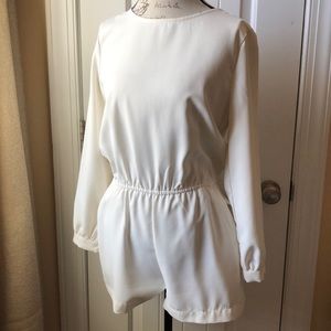 White/off white romper with pockets.